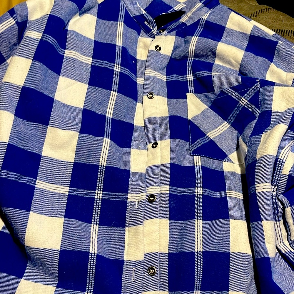 A white and blue casual sweater don’t really wear it